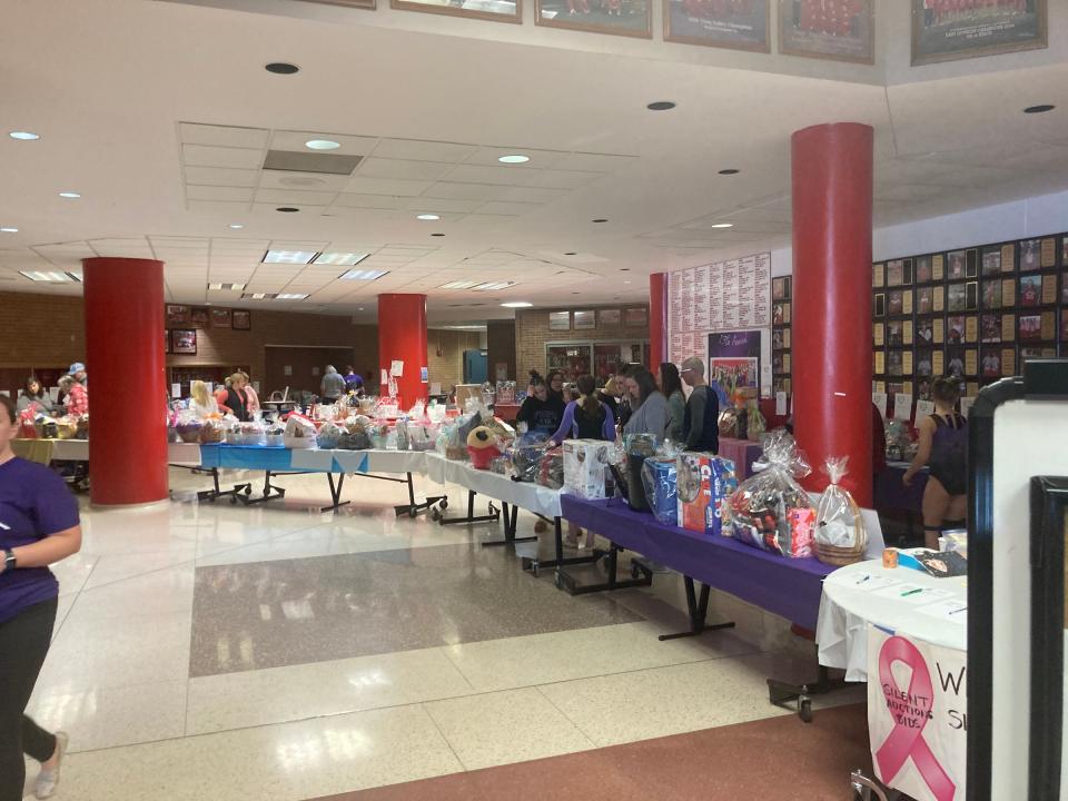 The Coldwater Gymnastics team raised thousands of dollars with auctions, item sales, and a very large silent auction, with all money raised going to local cancer centers.