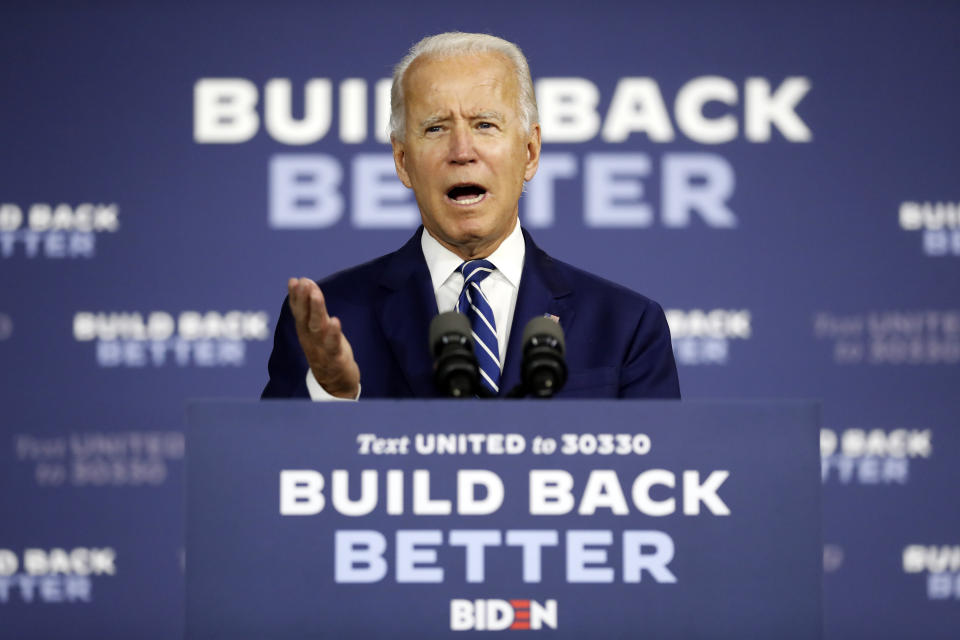 FILE - In this Tuesday, July 21, 2020, file photo, Democratic presidential candidate, former Vice President Joe Biden speaks at a campaign event at the Colonial Early Education Program at the Colwyck Training Center, in New Castle, Del. The 2020 spotlight is about to shift, at least temporarily, away from President Donald Trump and onto Biden. (AP Photo/Andrew Harnik, File)