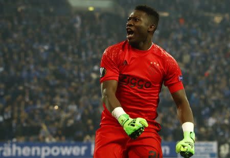 Football Soccer - Schalke 04 v Ajax Amsterdam - UEFA Europa League Quarter Final Second Leg - Veltins-Arena, Gelsenkirchen, Germany - 20/4/17 Ajax's Andre Onana celebrates after the match Reuters / Wolfgang Rattay Livepic