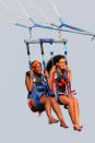 A risk-taking Rihanna didn't look the least bit nervous when she and a friend were hoisted high above the French Riviera on Tuesday via parasail. The pop star had a week full of adventures while visiting St. Tropez, where she was also spotted riding a Jet Ski and jumping on a water trampoline. Maybe we'll see her skydiving next! (7/24/2012)