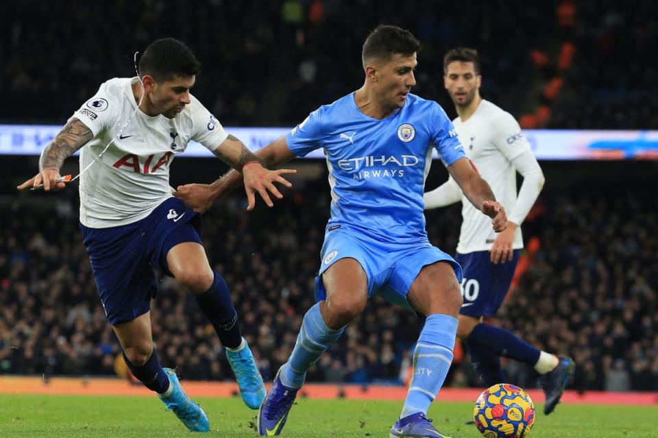 Rodri believes Tottenham can challenge for the Premier League title  (AFP via Getty Images)