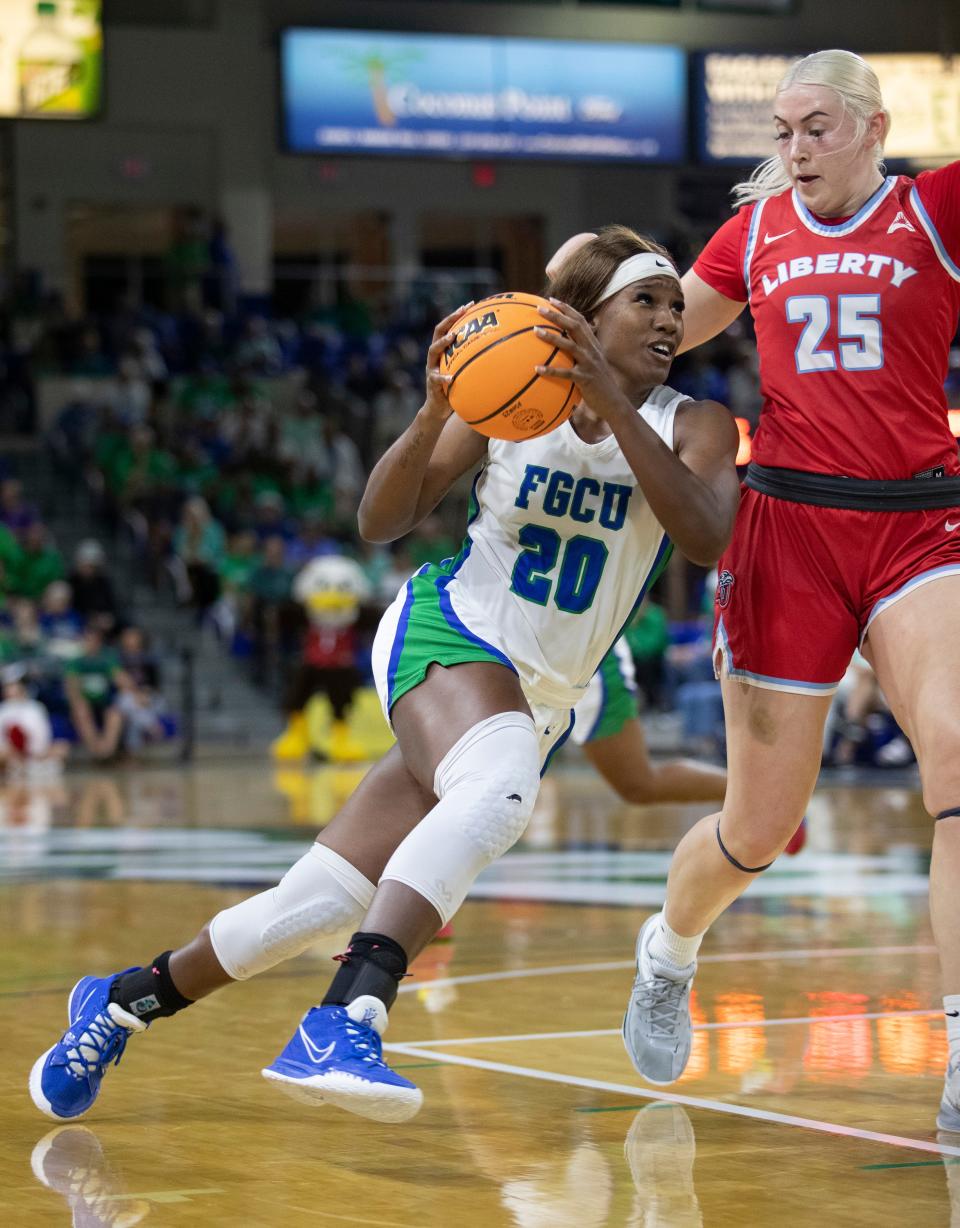 Sha Carter of FGCU drives to the basket against Liberty in the ASUN Women's Basketball Finals on Saturday, March 11, 2023, at Florida Gulf Coast University.