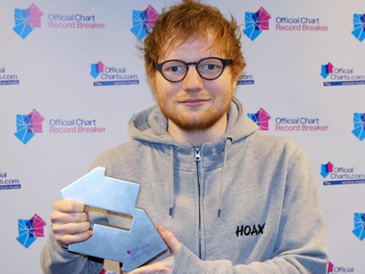 Ed Sheeran with his award: officalcharts.com