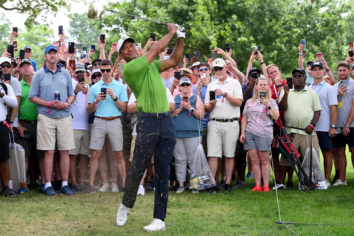 Tiger Woods plays his second shot on the first hole during the second round of the 2022 PGA Championship