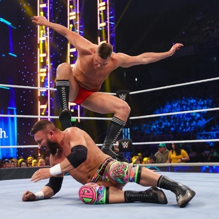 Wrestler Gunther stomps Ted Bolduc, aka Teddy Goodz, at the April 22 WWE Friday Night Smackdown.