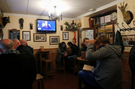 Spanish Prime Minister and Socialist Worker's Party candidate Pedro Sanchez is seen on a TV screen during a live televised debate ahead of general elections in Madrid, at a bar in downtown Ronda, southern Spain April 22, 2019. REUTERS/Jon Nazca