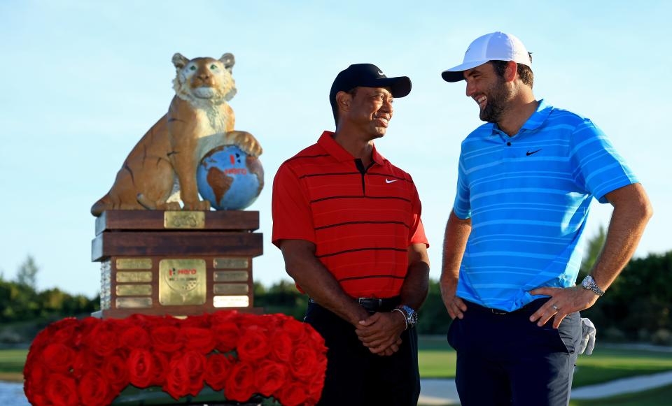 Golf's past and present this past December, when Tiger Woods congratulated Scottie Scheffler after Scheffler's win in the Hero World Challenge, which Tiger hosts.