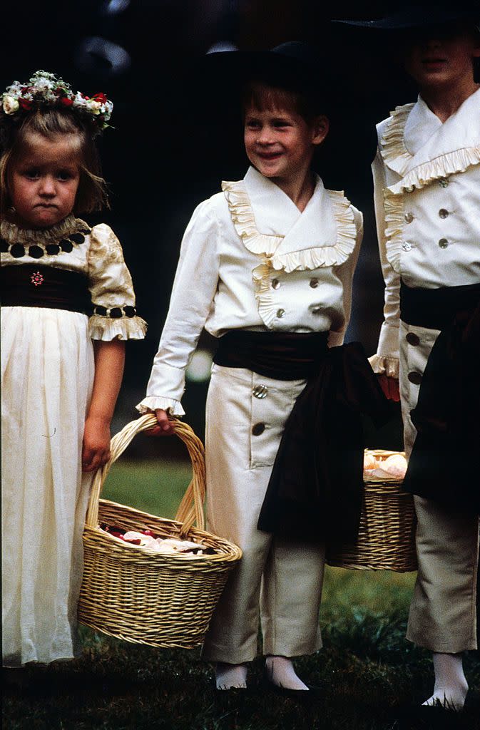 <p>Prince Harry performs the role of pageboy at the wedding of his uncle, Viscount Althorp, on September 17. Here, he's with his cousins Eleanor and Alexander Fellowes. </p>