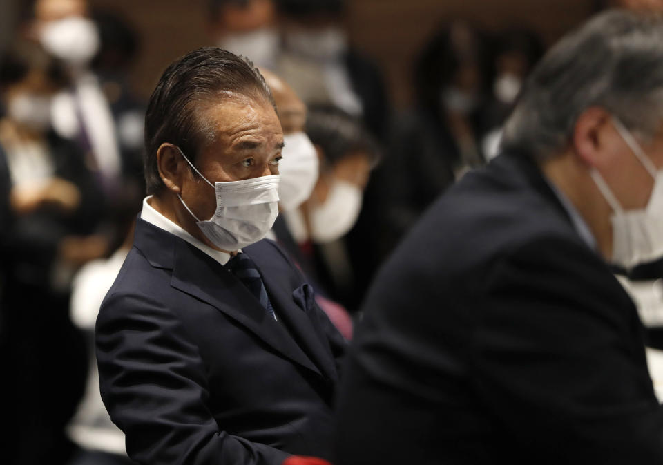 Haruyuki Takahashi, executive board member of the Tokyo Organizing Committee of the Olympic and Paralympic Games attends the Tokyo 2020 Executive Board Meeting in Tokyo, Japan Monday, March 30, 2020. Tokyo Olympic President Yoshiro Mori said Monday he expects to talk with IOC President Thomas Bach this week about potential dates and other details for the rescheduled games next year. (Issei Kato/Pool Photo via AP)