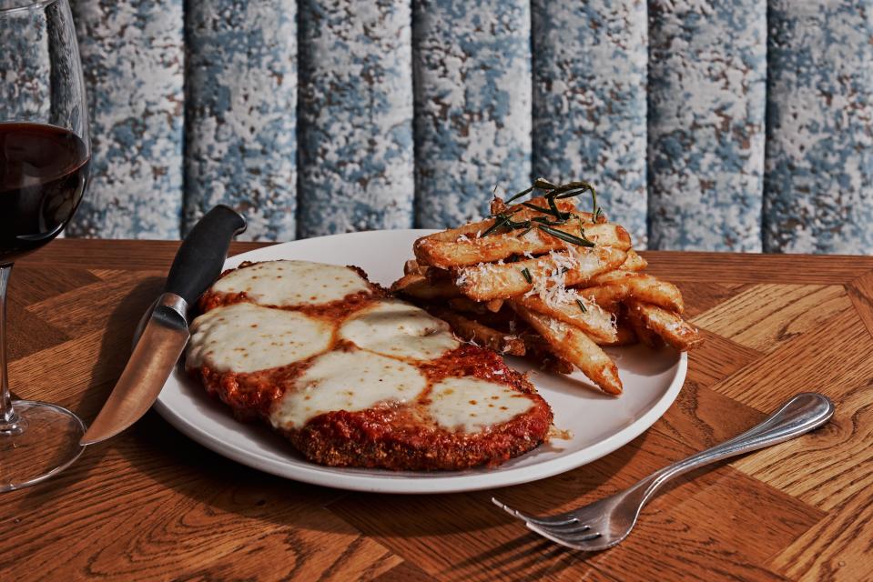The chicken parm with steak fries at Ella’s by Christian Petroni. The restaurant opens March 15 in Nashville, TN with a kitchen overseen by the Westchester chef.