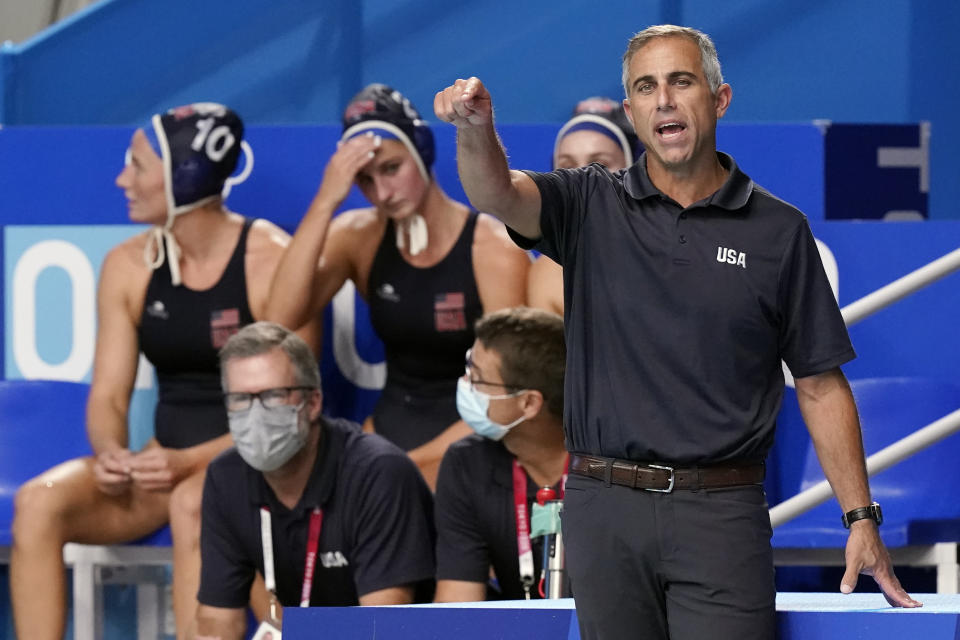 FILE - United States head coach Adam Krikorian directs players during a quarterfinal round win over Canada in a women's water polo match at the 2020 Summer Olympics, Tuesday, Aug. 3, 2021, in Tokyo, Japan. With the Paris Olympics coming up next year, U.S. women's water polo coach Adam Krikorian is feeling the pressure of time. No water polo team — men or women — has won four straight gold medals at the Games. (AP Photo/Mark Humphrey, File)