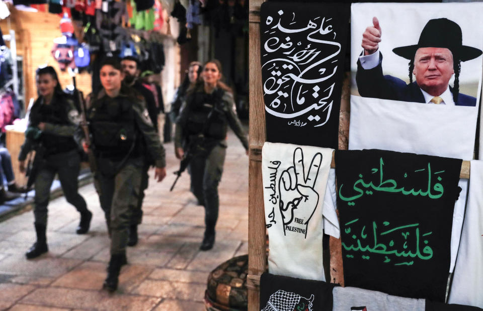 <p>Members of the Israeli borderguards walk past a souvenir shop displaying a T-shirt bearing an image of President Donald Trump dressed as a Hasidic Jew, in Jerusalem’s Old City on Dec. 4, 2017. (Photo: Ahmad Gharabli/AFP/Getty Images) </p>