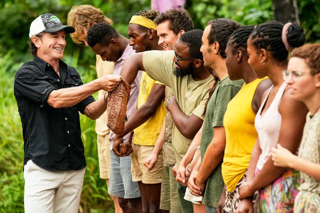 <p>Robert Voets/CBS</p> Jeff Probst and the cast of 'Survivor 46'