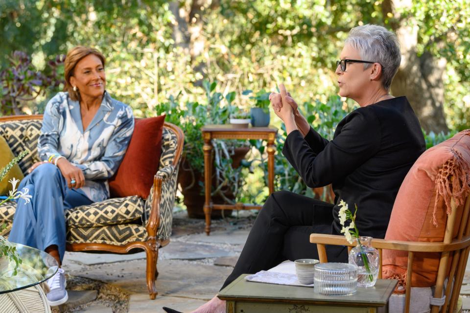 Robin Roberts listens intently to her "Turning the Tables" guest, "Halloween" actress Jamie Lee Curtis.