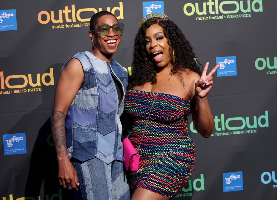 Jessica Betts in pathwork denim vest and pants and Niecy Nash-Betts in rrainbow striped tube dress attend OUTLOUD Music Festival at 2024 WeHo Pride on May 31, 2024 in West Hollywood, California. (Photo by Amy Sussman/Getty Images)