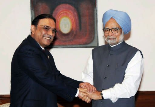 Handout from Pakistan's Press Information Department (PID) shows Pakistan's President Asif Ali Zardari (left) shaking hands with Indian Prime Minister Manmohan Singh during a meeting in New Delhi. Zardari became the first Pakistani head of state since 2005 to visit India for a one-day trip he described as "very fruitful" in improving ties between the rivals