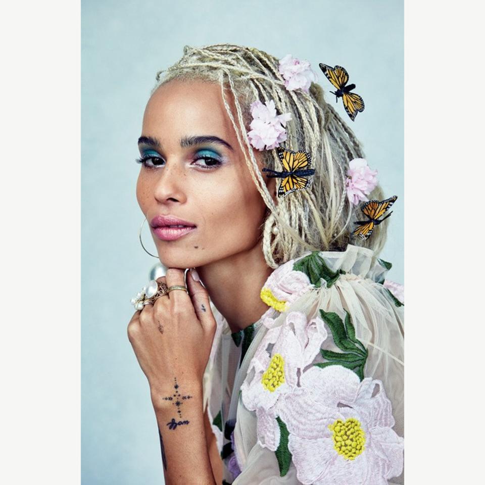 For the cover of <em>Allure</em>'s <a href="https://www.allure.com/story/zoe-kravitz-cover-story-june-2017?mbid=synd_yahoo_rss" rel="nofollow noopener" target="_blank" data-ylk="slk:June 2017 issue;elm:context_link;itc:0;sec:content-canvas" class="link ">June 2017 issue</a>, Zöe Kravitz's signature micro braids (this time in platinum blonde) were accessorized with charming faux flowers and butterflies, courtesy of Nikki Nelms. The result? An ethereal, mystical style.