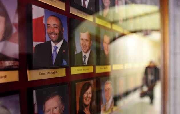 A portrait of Senator Don Meredith is displayed on the wall alongside fellow senators on Parliament Hill in Ottawa on May 9, 2017.
