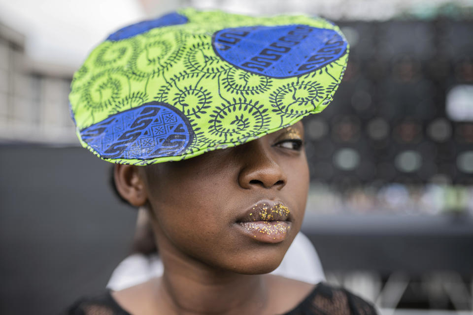 A model presents a hat by Democratic Republic of the Congo fashion designer Nadege Kapiinga during the ninth edition of the Liputa fashion show in Goma, Democratic Republic of Congo, Saturday June 24, 2023. The objective of the show, involving designers, models and artists from DRC, Cameroon, Central African Republic, Senegal, Burundi, France, United States and others, is to reveal the latest trends, but also to deliver a message of peace and peaceful coexistence during a period of high tension between the DRC and Rwanda, accused by Kinshasa of supporting the M23 rebellion in the east of country. (AP Photo/Moses Sawasawa)