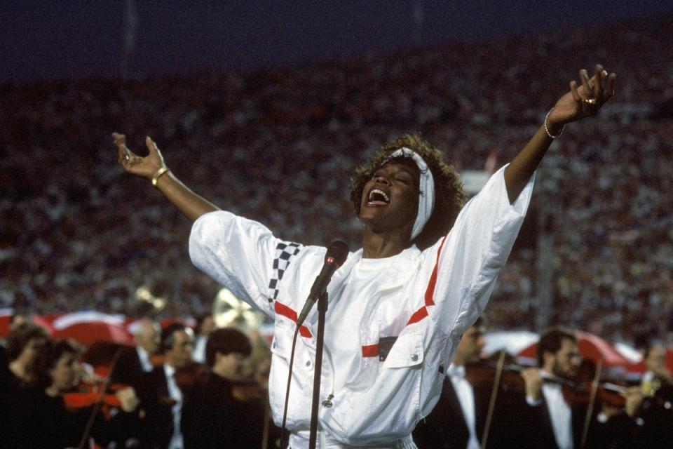 Whitney Houston sings the National Anthem before a game with the New York Giants taking on the Buffalo Bills prior to Super Bowl XXV in 1991 (Getty Images)