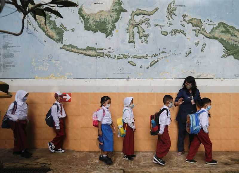 Schools reopen on trial basis as the government extends restrictions to curb the spread of coronavirus disease (COVID-19) in Jakarta