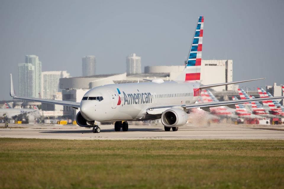 In this February 2019 file photo, an American Airlines Boeing 737-800 taxis to runway 8R at Miami International Airport.