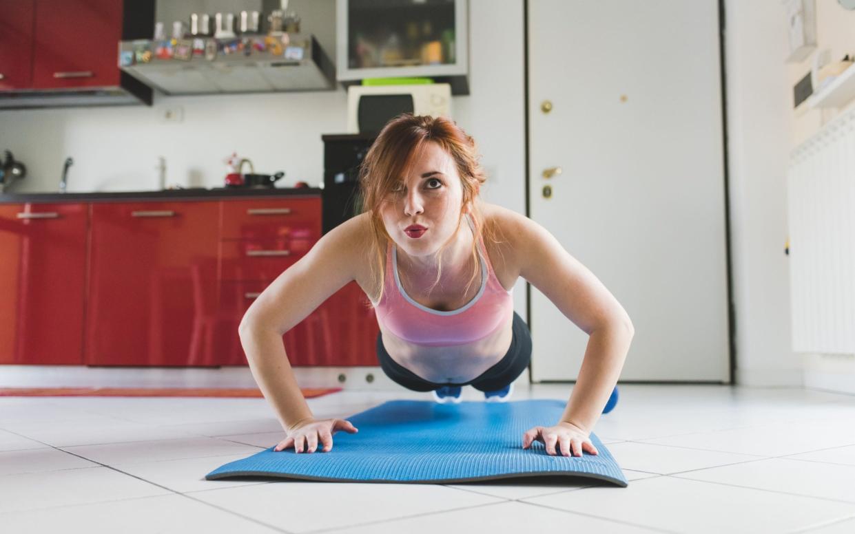 You could sneak in a few press-ups while waiting for dinner to cook - Getty