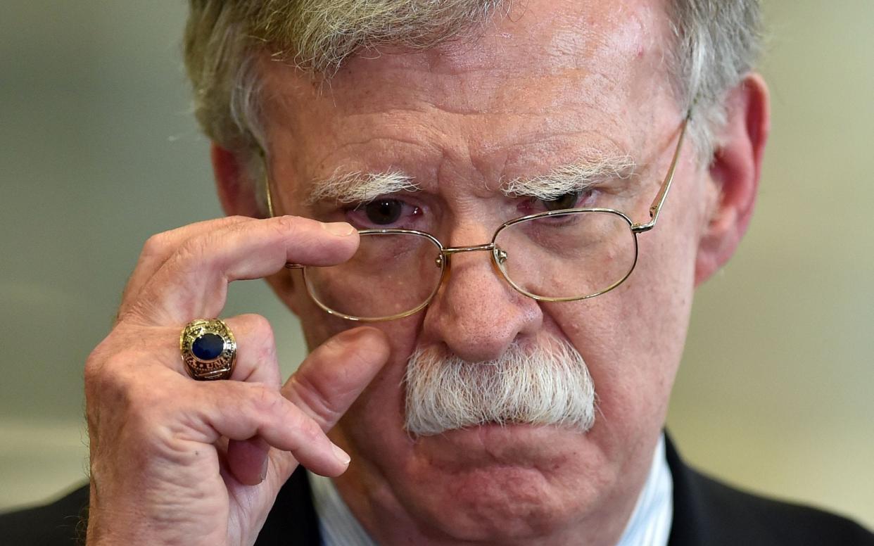 John Bolton is under renewed pressure to testify in the president's impeachment trial - AFP