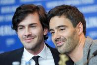 Actor Miguel Nunes and director Ivo Ferreira (R) pose at a news conference to promote the movie Cartas da guerra (Letters from War) at the 66th Berlinale International Film Festival in Berlin February 14, 2016. REUTERS/Stefanie Loos