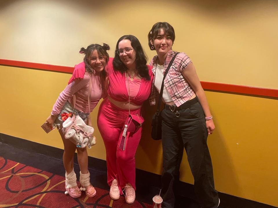 Krystal Rivera, Tiffany Whittaker and Emily Foster dress up to see Barbie on July 25.