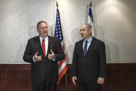 US Secretary of State Mike Pompeo and Israeli Prime Minister Benjamin Netanyahu speak during their meeting in Lisbon Wednesday, Dec. 4, 2019. (AP Photo/Patricia De Melo Moreira, Pool)