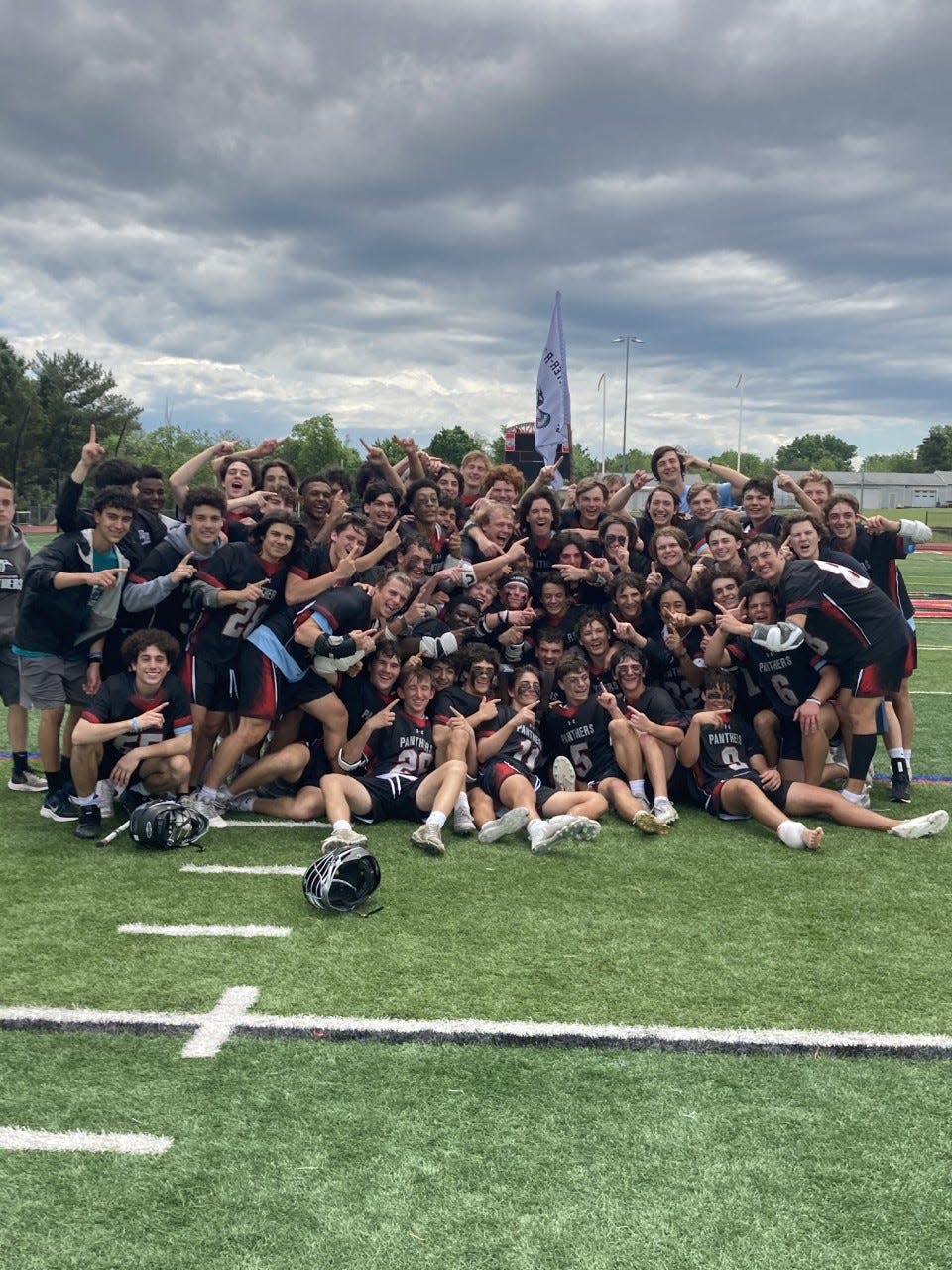 The Bridgewater-Raritan boys lacrosse team celebrates after winning the North Group 4 title on May 28, 2022