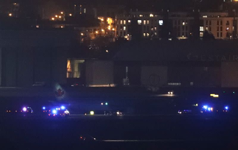 A Boeing 767 aircraft flown by Air Canada makes an emergency landing at Madrid's Barajas Airport