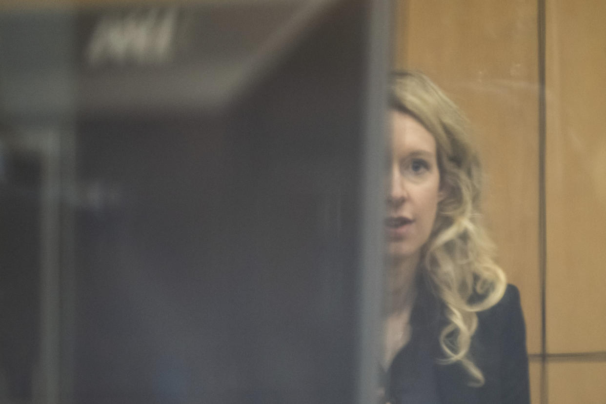 Theranos founder and CEO Elizabeth Holmes arrives to federal court in San Jose, Calif., Friday, Nov. 18, 2022. A federal judge will decide whether Holmes should serve a lengthy prison sentence for duping investors and endangering patients while peddling a bogus blood-testing technology. (AP Photo/Nic Coury)