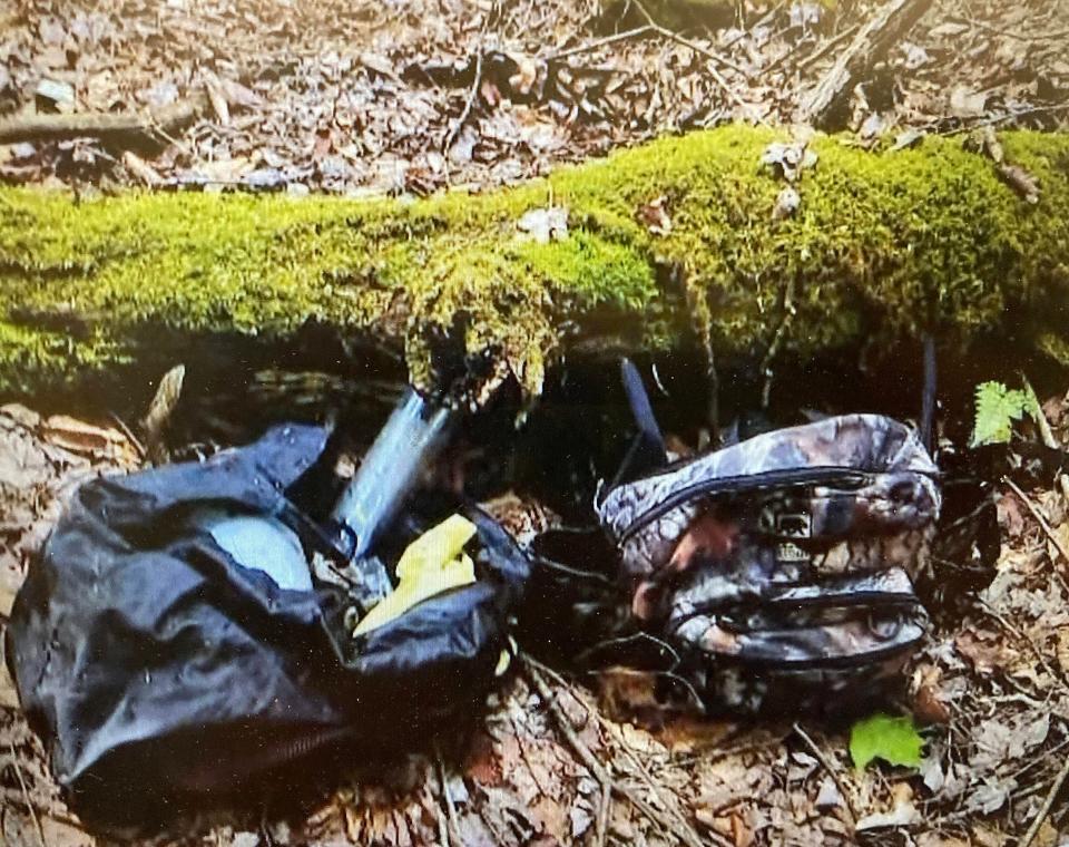 Pennsylvania State Police said this cache, found in the woods outside Warren, Pa., belonged to Michael C. Burham, who escaped from the Warren County Prison on July 6. State police on Thursday disclosed the discovery of the cache and released a photo of it.