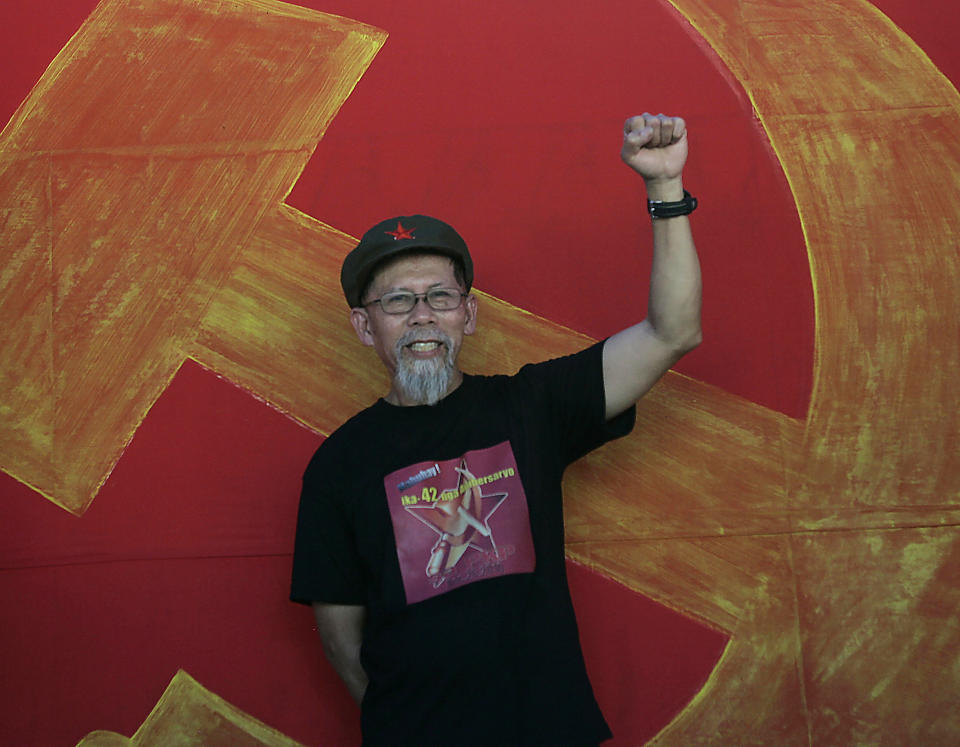 FILE - Communist rebel Jorge Madlos poses for photos during the celebration of the 42nd anniversary of the Communist Party of the Philippines Sunday, Dec. 26, 2010, at Mt. Diwata in the southern Philippines. Philippines Defense Secretary Delfin Lorenzana announced Monday, Nov. 1, 2022, that military forces have killed the rebel commander Madlos in a Saturday clash in the mountainous hinterlands of Bukidnon province, saying it was a major blow to the already battered New People’s Army guerrilla group. (AP Photo/Pat Roque, File)