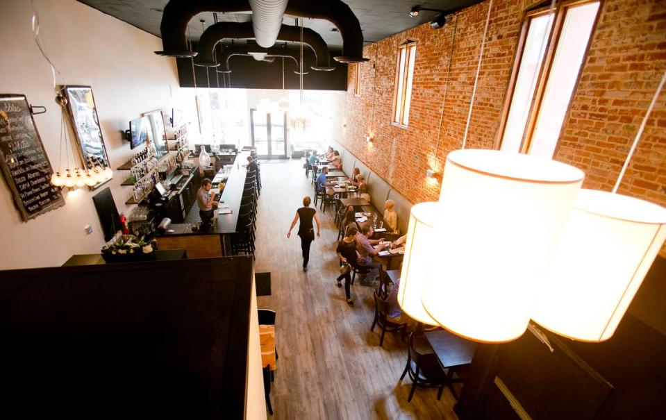 From an upstairs eating area, the bar and ground-floor dining room at Juniper in Boise. Statesman file photo