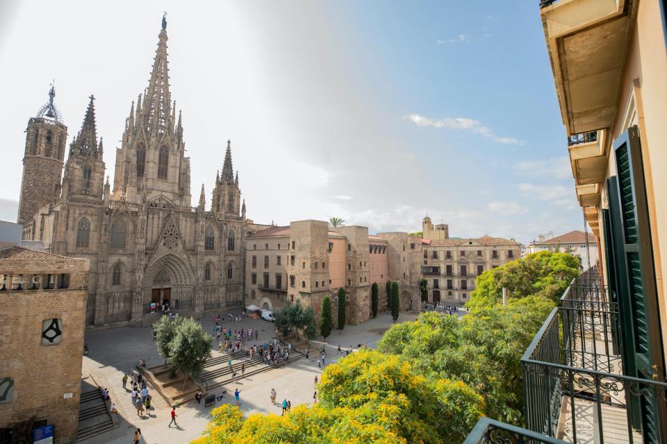 a photo of Barcelona with tourists walking around