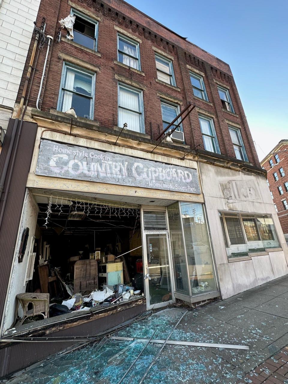 The front of the abandoned Country Cupboard in Rochester. Saturday's windstorm caused the front window of the building to be pushed out of the frame and shatter across the sidewalk.
