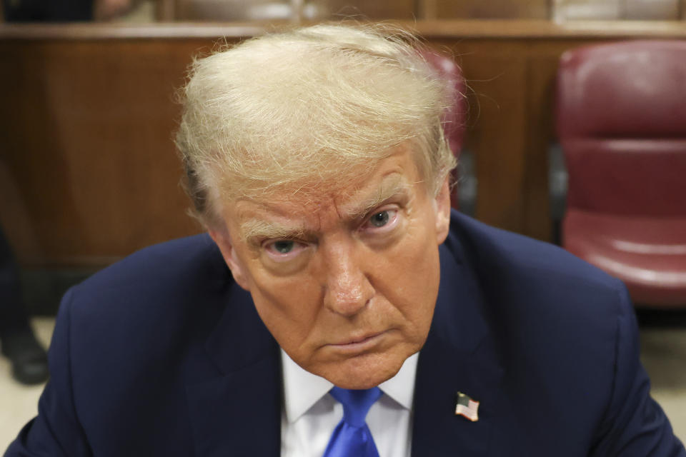 Former President Donald Trump awaits the start of proceedings at Manhattan criminal court, Monday, April 22, 2024, in New York. Trump is accused of falsifying internal business records as part of an alleged scheme to bury stories he thought might hurt his presidential campaign in 2016. (AP Photo/Yuki Iwamura, Pool)