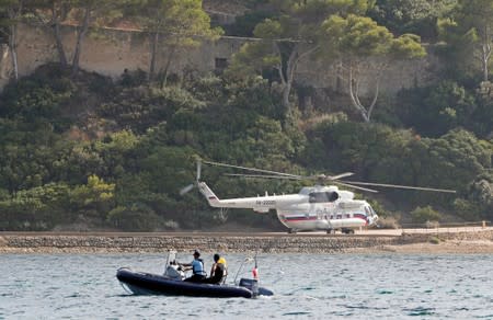 Russian President Vladimir Putin and French President Emmanuel Macron meet at the Bregancon Fort, in Bregancon