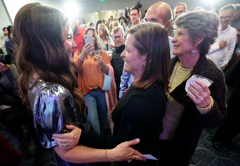 Salt Lake County Mayor Jenny Wilson, right, congratulates Salt Lake City Mayor Erin Mendenhall, left, after preliminary results show her in a strong lead at an election night watch party for her reelection campaign in the same office building that houses her campaign headquarters in downtown Salt Lake City on Tuesday, Nov. 21, 2023. | Kristin Murphy, Deseret News