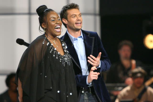 <p>Jason Merritt/FilmMagic</p> Mandisa on season 5 of 'American Idol' with Ryan Seacrest in 2006.