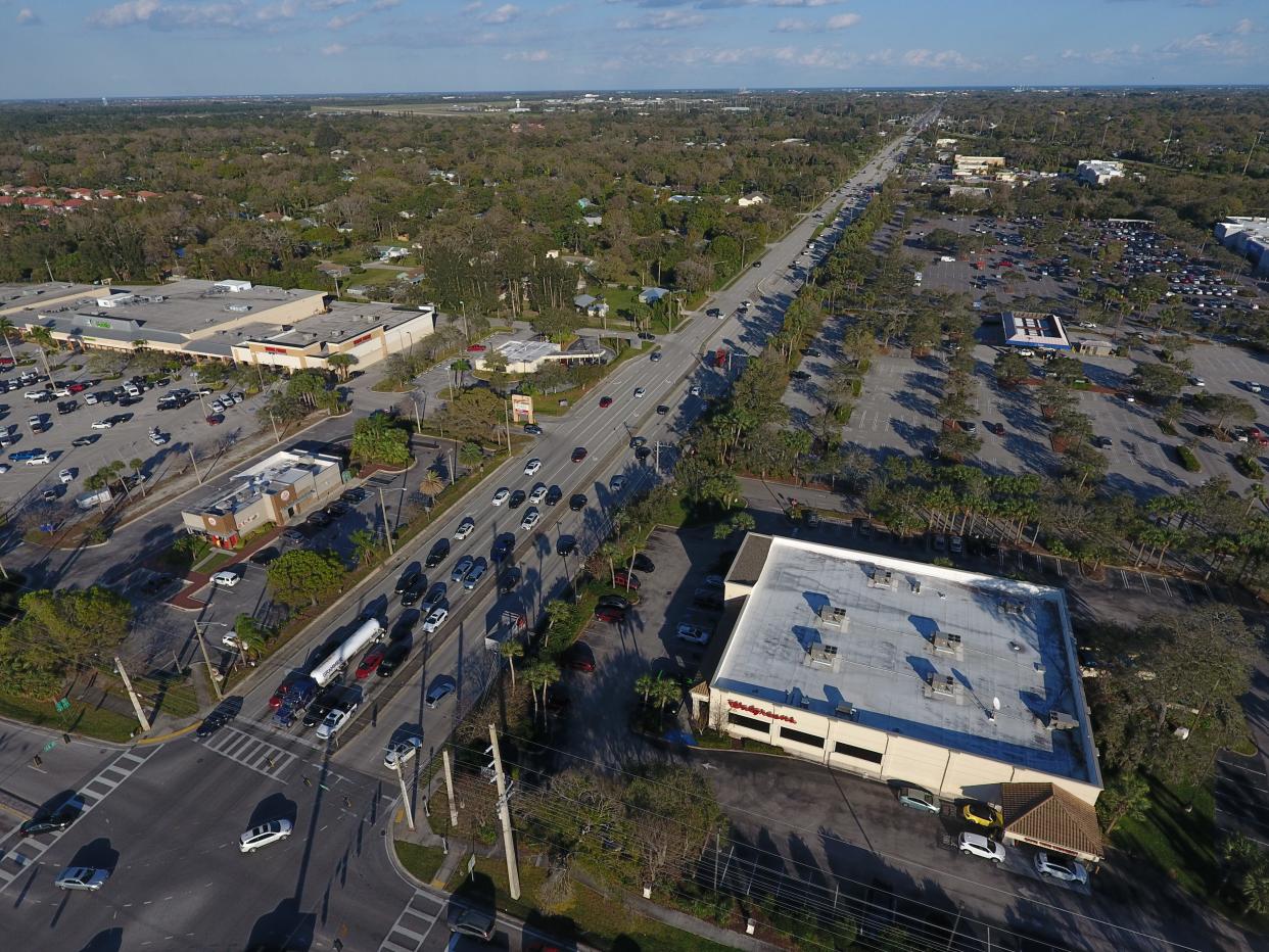 Drone image of State Road 60 looking east at 58th Avenue in Indian River County. Ryanwood Square shopping plaza on left; Walgreen's on right.