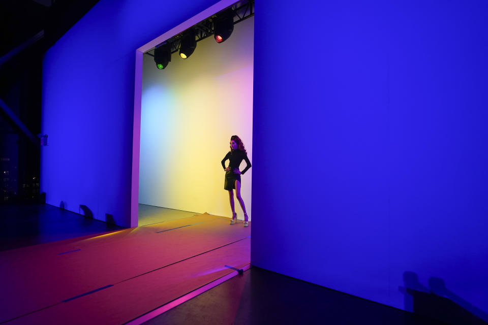 A model prepares to walk the runway during a rehearsal of the Sergio Hudson collection presentation during Fashion Week, Saturday, Feb. 11, 2023, in New York. (AP Photo/Mary Altaffer)