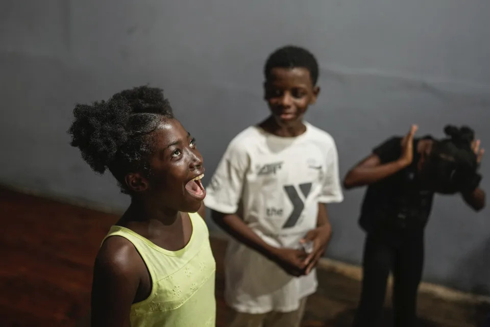 Juliana St. Vil, 12, who now lives in a shelter after fleeing gang violence in her neighborhood, rehearses her role in a skit for an acting workshop called “Theater Curbs Violence” in Port-au-Prince, Haiti, on Wednesday, May 15, 2024. The skit, which depicts life in a shelter in Haiti, will be performed for the public at the end of the two-week workshop. (AP Photo/Ramon Espinosa)