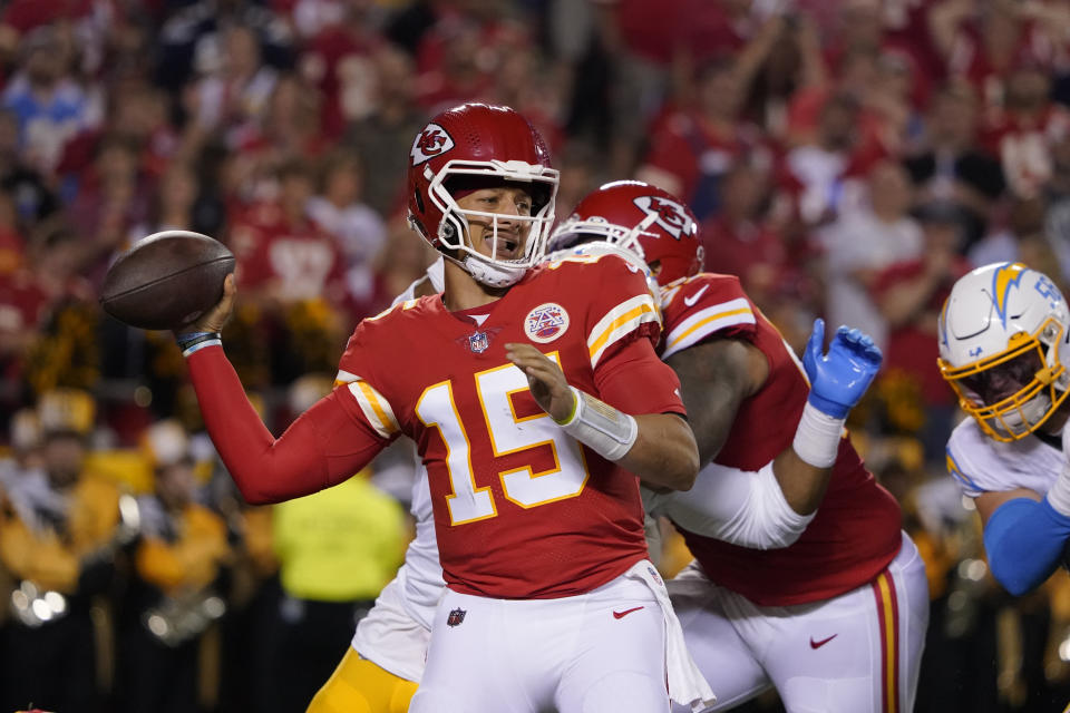 Kansas City Chiefs quarterback Patrick Mahomes throws during the first half of an NFL football game against the Los Angeles Chargers Thursday, Sept. 15, 2022, in Kansas City, Mo. (AP Photo/Ed Zurga)