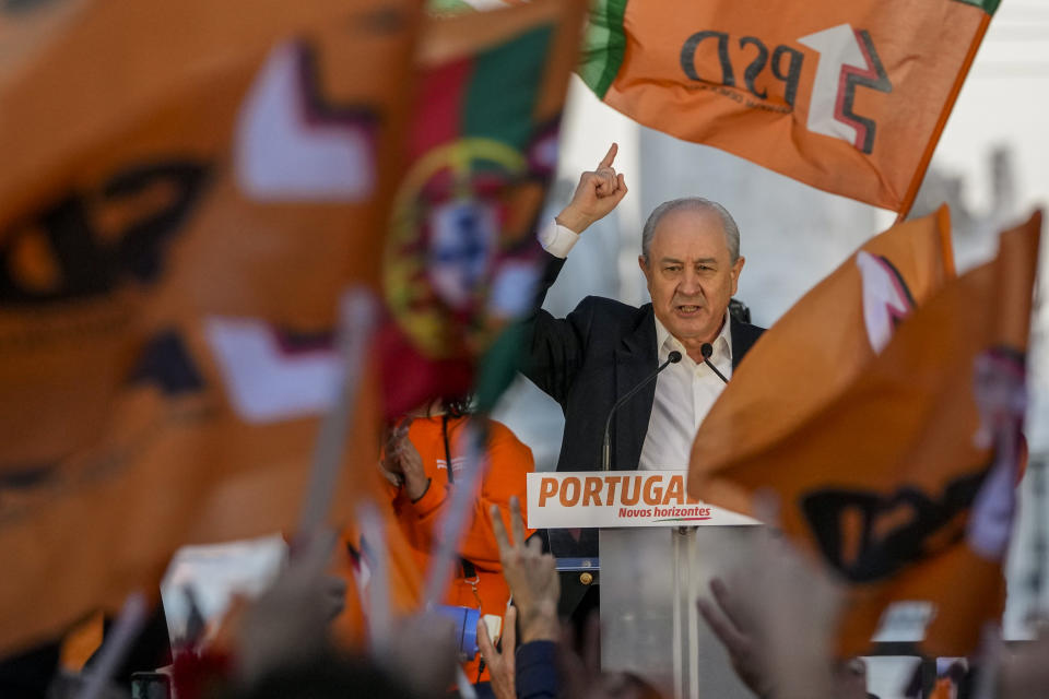 Rui Rio, leader of the center-right Social Democratic Party gestures while campaigning in downtown Lisbon, Friday, Jan. 28, 2022. Portugal holds a general election on Jan. 30. (AP Photo/Armando Franca)