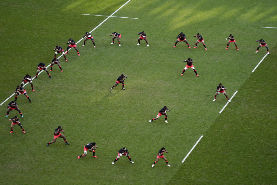 Fiji players perform The Cibi before the Rugby World Cup quarterfinal match between England and Fiji at the Stade de Marseille in Marseille, France, Sunday, Oct. 15, 2023. (AP Photo/Lewis Joly)