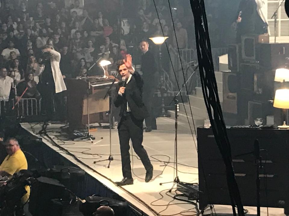 Matthew "Matty" Healy waving to a sold-out UPMC Events Center crowd at The 1975 show.